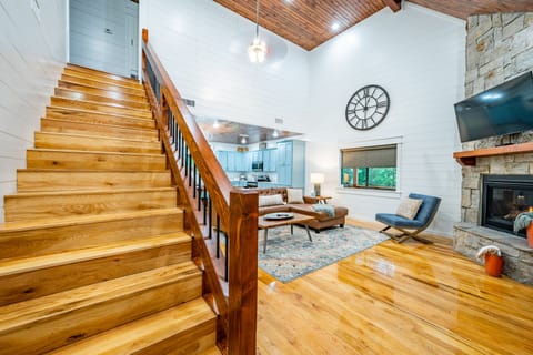 The stairs lead to 2 King Suites!