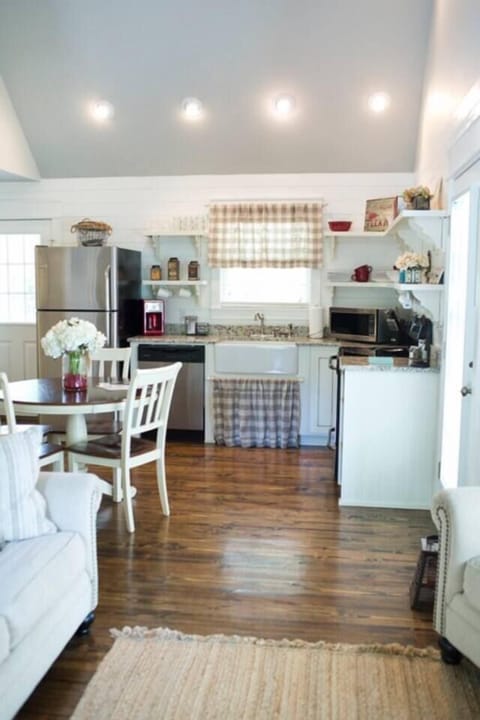 Fully equipped farmhouse kitchen in unique arkansas cottage