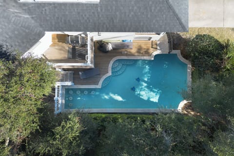 Step outside to your own private oasis featuring a heated pool, perfect for year-round relaxation. The spacious outdoor deck is ideal for lounging, dining, or enjoying the fresh air, and the propane grill makes it easy to cook up a delicious meal.