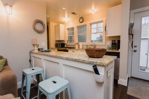 Convenient counter seating for morning coffee for adults or cereal for the kids!