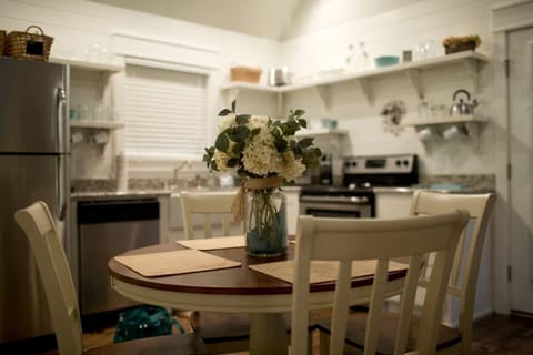 Modern Farmhouse kitchen in cottage rental with dinette set