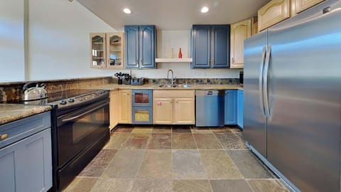 Spacious kitchen for making family dinners after a long day outside.