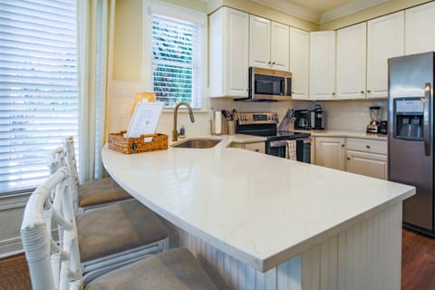 There's plenty of room in the kitchen for you and your guests to prepare your meals.