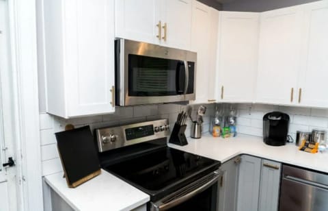 Kitchen stocked with cereal, breakfast bars and coffee for your stay.
