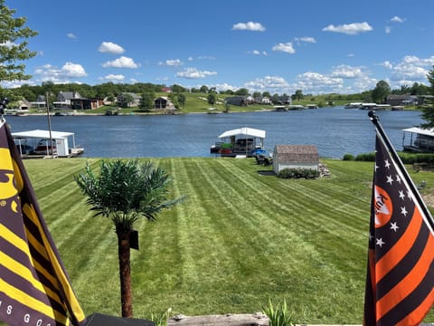 view from the back deck of the yard and lake