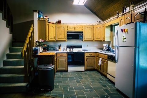 Kitchen is fully stocked with all the pots and pans you need to cook