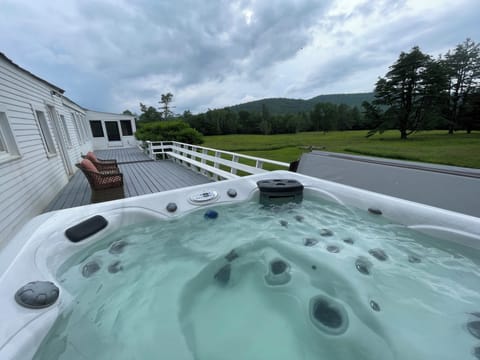 View from hot tub of back fields, and Wanosha and Tecumseh Mtns