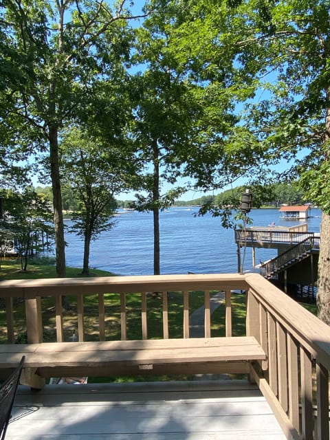 View of the lake from the wrap around deck off the living area of the house