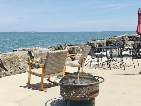 Enjoy the lake front patio with lots of seating for your group.