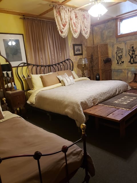 Kind Bed and one single twin bed..