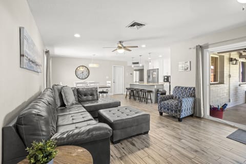 You'll find a large sectional sofa and huge flat screen tv connected to streaming services like Netflix and Hulu.