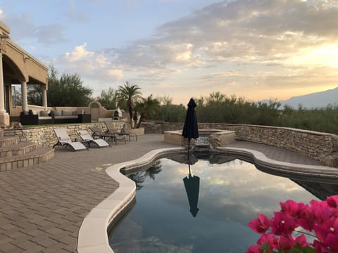Amazing pool area.  4 lounge chairs.