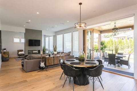 Kitchen w/ sliding nano doors to deck