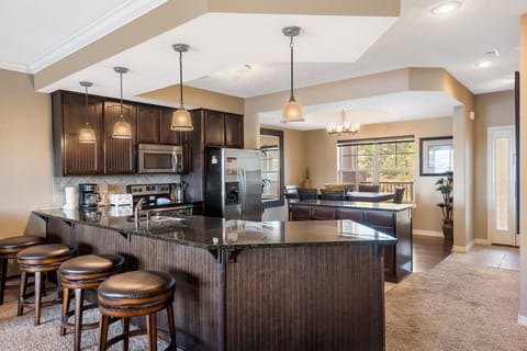 Full Kitchen with Additional Bar Seating