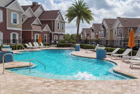 Take a dip in the sparkling community pool! Surrounded by palm trees and plenty of lounge chairs, it's the ideal spot to soak up the Florida sun and enjoy some family fun outside the parks.