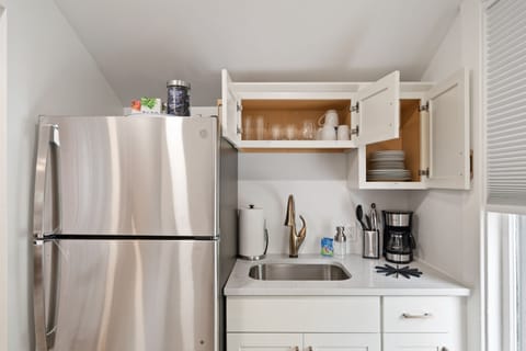 We've got you covered! Coffee maker has been replaced with a Keurig. Starter supplies of K-cups, sugar, creamer provided.