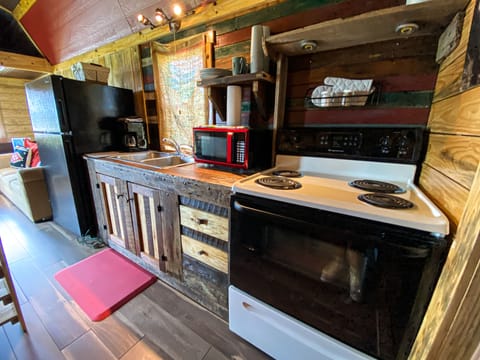 Full Kitchen-Stove Top & Oven-some pots/pans, plates, cups, utensils provided