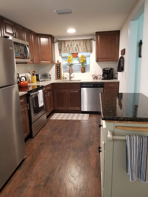 Updated kitchen with all the tools available to prepare meals if you choose
