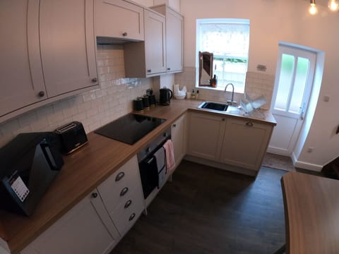 Kitchen leading to rear yard