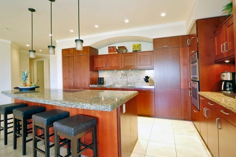 Gourmet kitchen with counter seating
