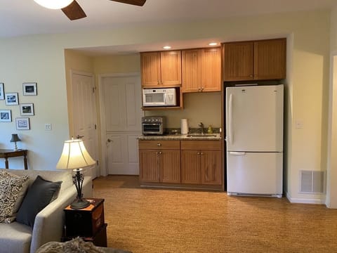 Small kitchenette on lower level adds comfort and extra storage space.