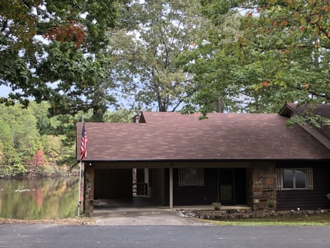 Carport plus one driveway parking spot. More parking where photo taken from