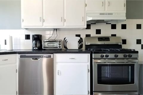 Whip up your next gourmet meal in the full kitchen. (1st Floor)
