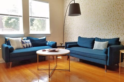 TV room has two lovely sofas waiting for you to lounge on. (1st Floor)
