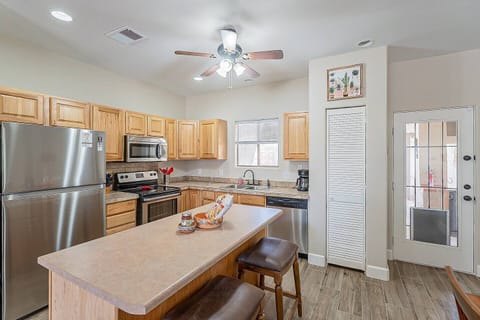 This cozy kitchen with an island gives you plenty of space to whip up a meal that your entire group will enjoy.