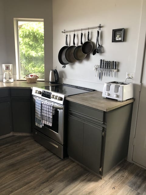 The kitchen features a brand new oven range that gets you cooking in a flash.