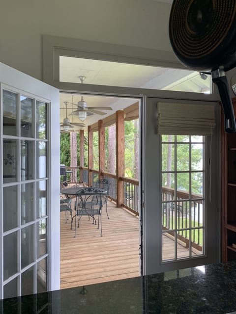 Grill out on the upstairs deck attached to kitchen - charcoal grill available 