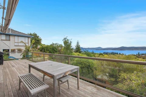 Step onto the expansive balcony and indulge in panoramic river views while sharing a BBQ feast or sipping wine under the open sky.