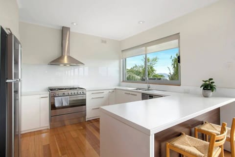 Create delicious meals in the fully equipped kitchen with an oven, dishwasher, and generous bench space for effortless meal prep.