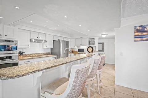 The fully-equipped kitchen has everything you need to cook while on your vacay