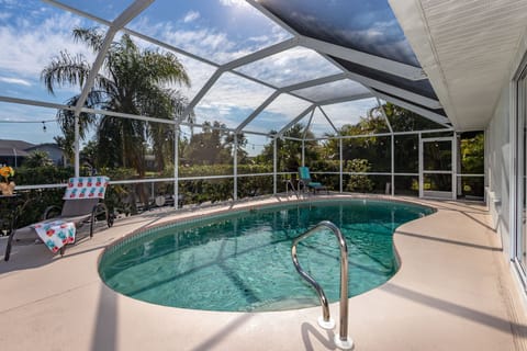 Enjoy the saltwater electric-heated pool at Villa ChristyLee