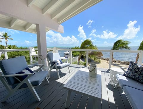 Breezy beachfront from 2nd floor deck overlooking the ocean
