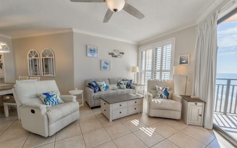 Spacious living area with new soda sleeper and coastal decor (September 2023)