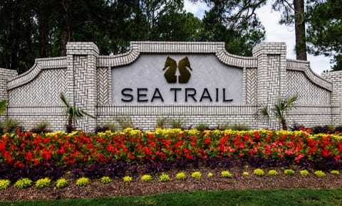 Enter the East Entrance of Sea Trail, closest to the Sunset Beach Bridge!