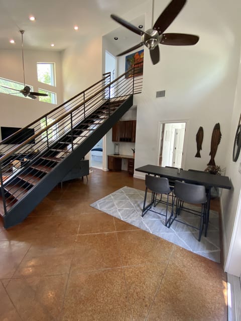 The central staircase perfectly connects the open-floor plan to the 2nd floor.