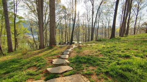 Flagstone path to firepit and views of the river and Riverside Dr.