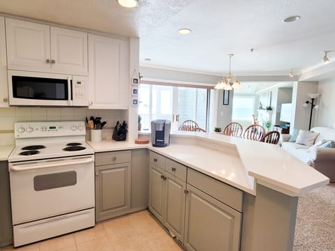 Newly renovated kitchen with quartz counters