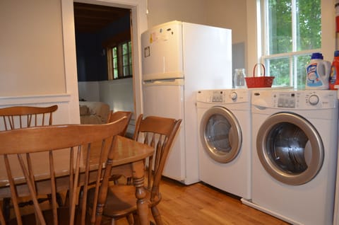 Laundry and fridge in breakfast nook