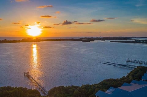 Aerial view of fishing pier and sunset over Casey Key
