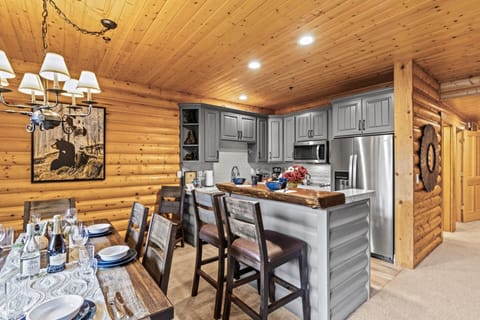 Modern rustic kitchen with wood accents, bar seating, and cozy lighting.
Side A BBL-351COMBO