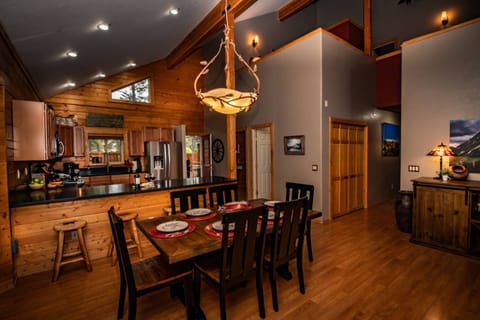 Dine in the large, open kitchen. Around the corner is a fantastic equipped pantry! Garage access, laundry & 1/2 bath are also located down the hall.