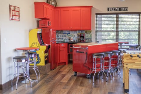 Lower level. Wet bar with fridge, microwave and air fryer on entry level