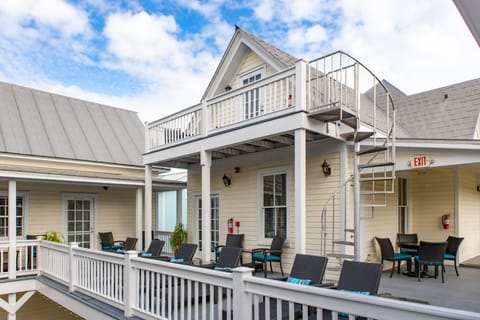 View the pool and sundeck from your private treetop balcony