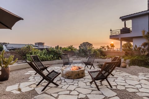 Relax by the firepit as the sun starts to set.