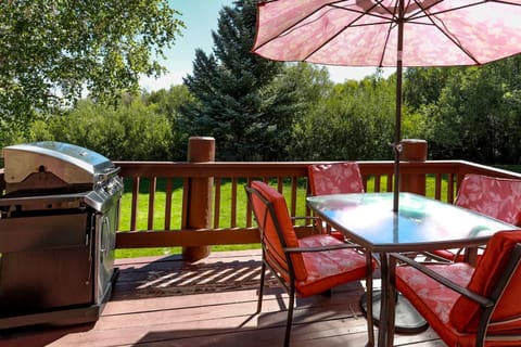 Inviting patio with cozy seating and fresh air, perfect for morning coffee or evening gatherings with scenic views