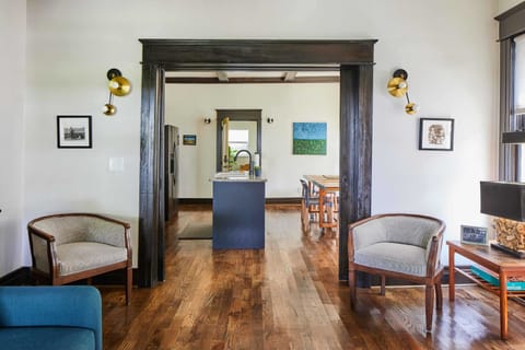 The living room opens onto the kitchen dining room.